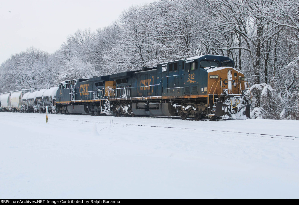 Outlawed Q422 awaits a new crew to go north in fresh snow 